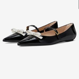 STUART WEITZMAN FELICITY MARY JANE
FLAT in BLACK/CREAM Sz 10 gently used 
$425